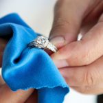 Man cleaning jewelry