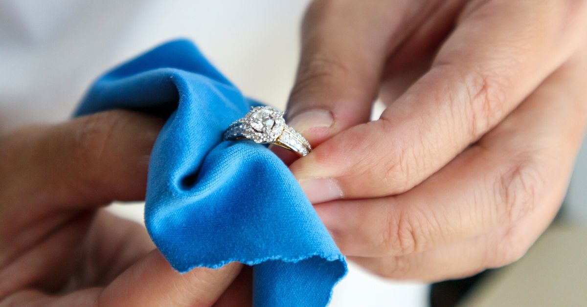 Man cleaning jewelry